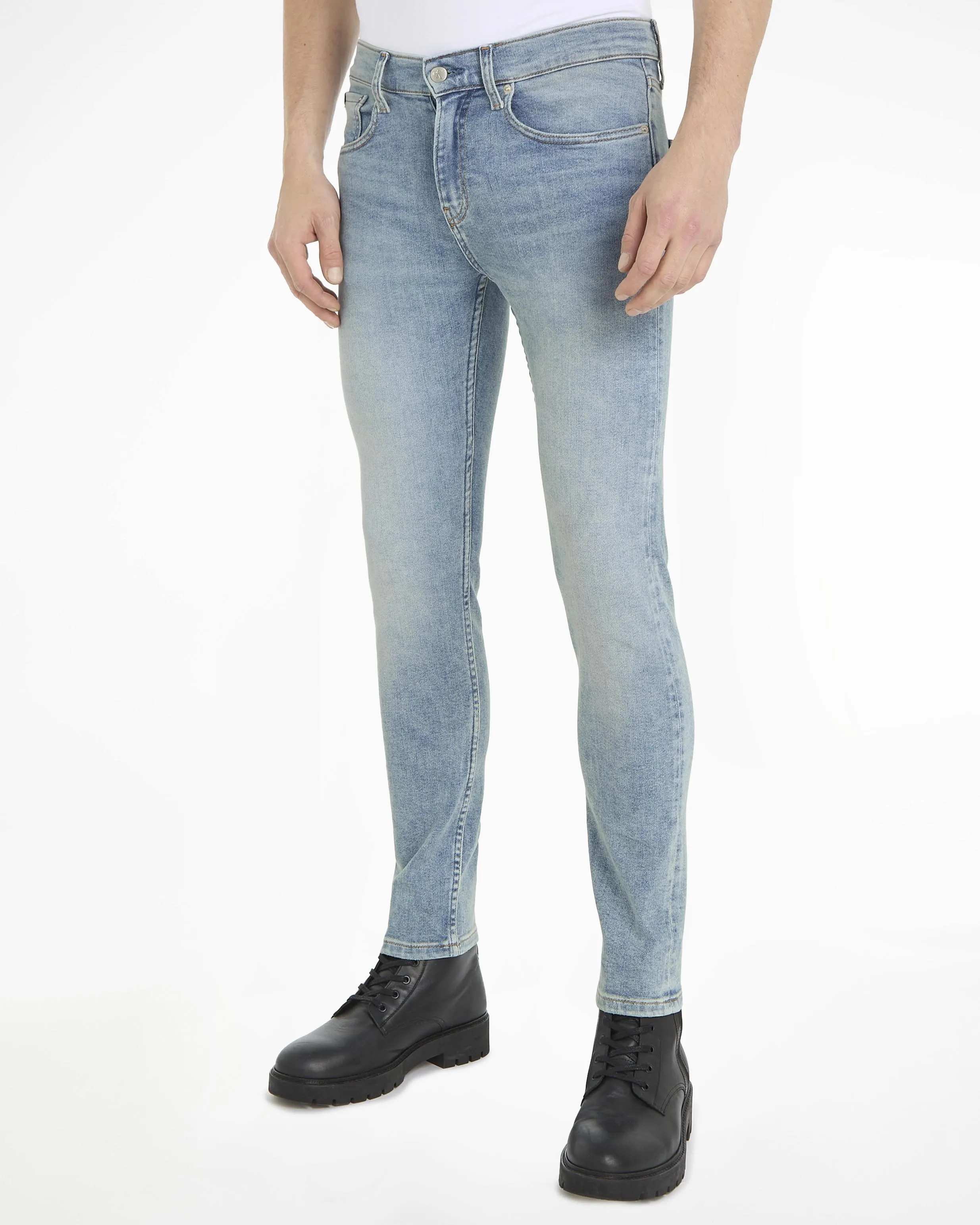 Jeans skinny-fit a vita bassa in cotone stretch lavaggio chiaro con sabbiature